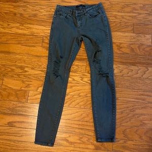 Black distressed skinny jeans